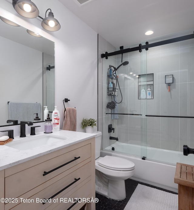 112 Aspen Meadows Rd Unit 36, Driggs, ID 83422 - full bath with vanity, enclosed tub / shower combo, and tile patterned flooring