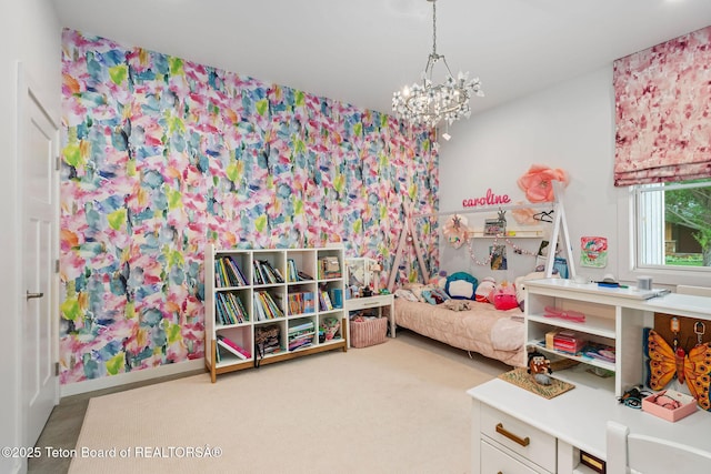 4345 Melody Ranch Dr, Jackson, WY 83001 - carpeted bedroom featuring a chandelier and baseboards