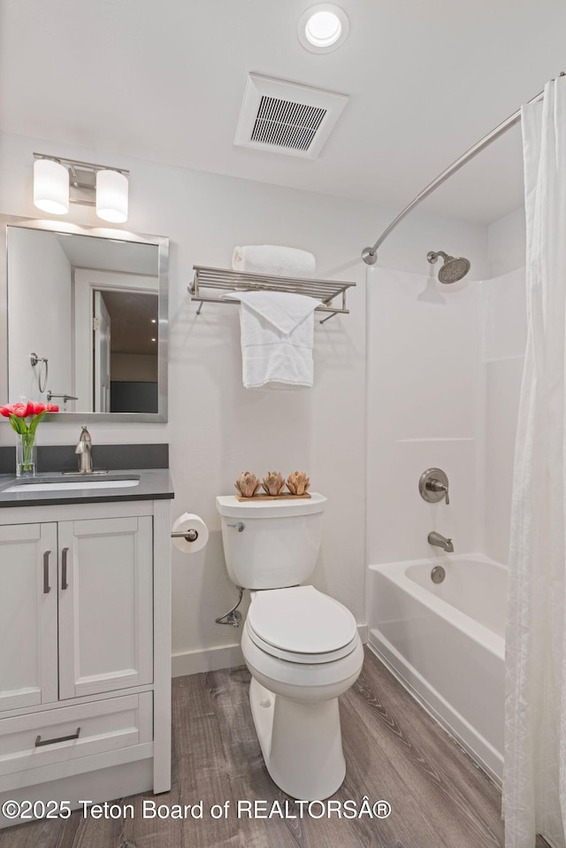 4345 Melody Ranch Dr, Jackson, WY 83001 - full bathroom featuring wood finished floors, vanity, and shower / tub combo