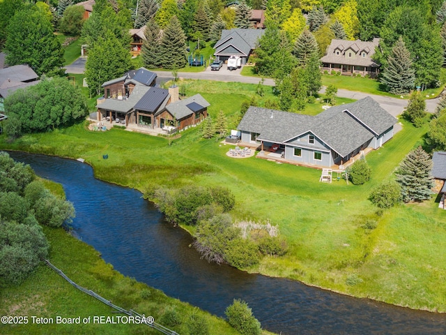 4345 Melody Ranch Dr, Jackson, WY 83001 - view of subject property with a nearby body of water