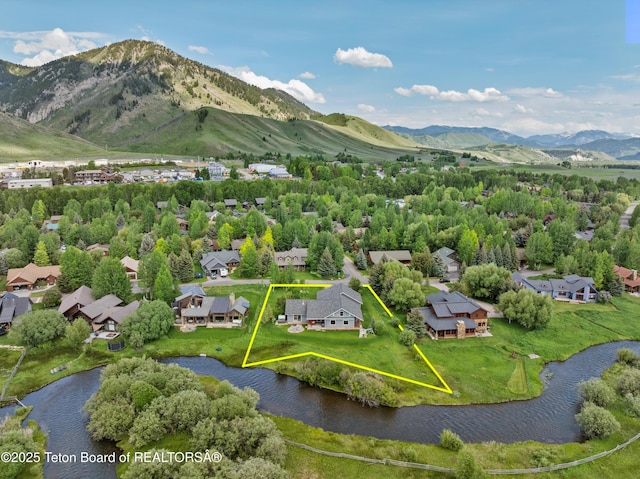 4345 Melody Ranch Dr, Jackson, WY 83001 - aerial view of residential area featuring a water and mountain view and property boundaries highlighted