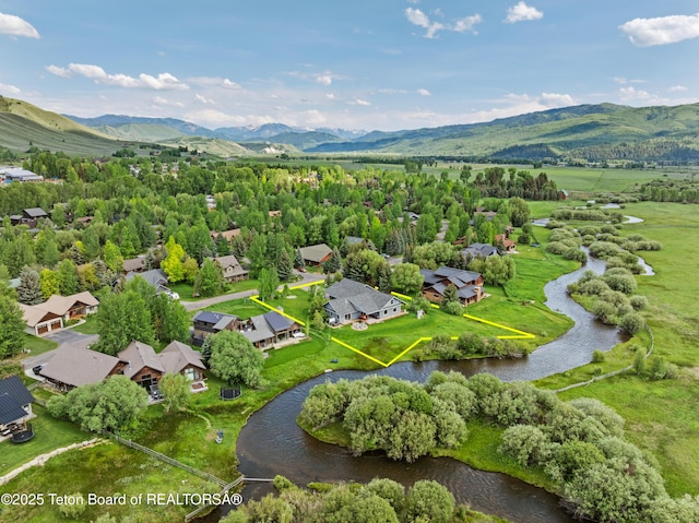 4345 Melody Ranch Dr, Jackson, WY 83001 - aerial view of property's location featuring property boundaries highlighted and a water and mountain view