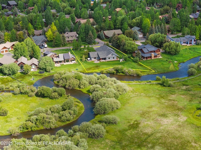 4345 Melody Ranch Dr, Jackson, WY 83001 - aerial view of residential area with property boundaries highlighted and a large body of water