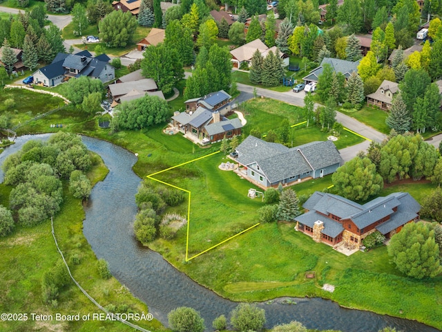 4345 Melody Ranch Dr, Jackson, WY 83001 - aerial perspective of suburban area featuring a nearby body of water and property boundaries highlighted