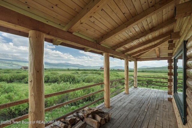 15 S Rainbow Dr, Cora, WY 82925 - deck with a view of rural / pastoral area and a mountain view