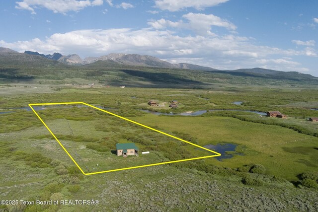 15 S Rainbow Dr, Cora, WY 82925 - overview of rural landscape with a mountainous background and property parcel outlined