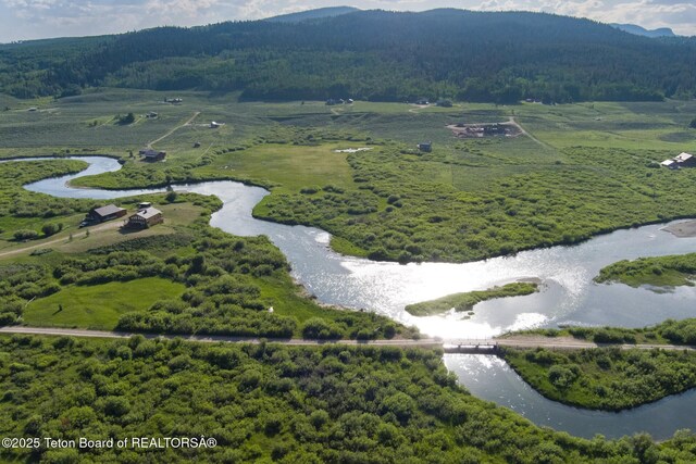 15 S Rainbow Dr, Cora, WY 82925 - view of rural area with a forest and a water and mountain view