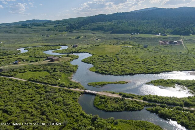15 S Rainbow Dr, Cora, WY 82925 - aerial view of a water and mountain view and a heavily wooded area