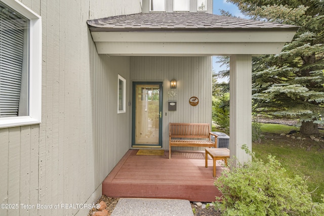 536 Shadow Brook Ln, Driggs, ID 83422 - doorway to property with a wooden deck and a shingled roof
