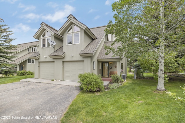 536 Shadow Brook Ln, Driggs, ID 83422 - multi unit property with a shingled roof, driveway, an attached garage, and a front lawn