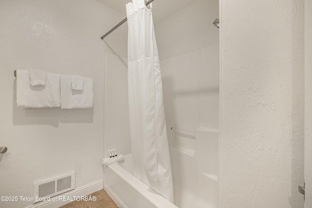 536 Shadow Brook Ln, Driggs, ID 83422 - bathroom featuring shower / bath combination with curtain and tile patterned flooring