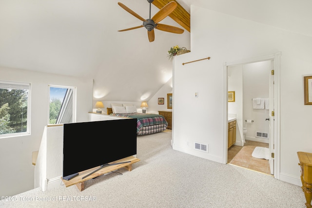 536 Shadow Brook Ln, Driggs, ID 83422 - bedroom with lofted ceiling, light colored carpet, and ensuite bath