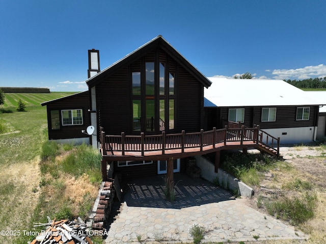 3525 W 13000 N, Felt, ID 83424 - rear view of property with a wooden deck, a patio, and a chimney