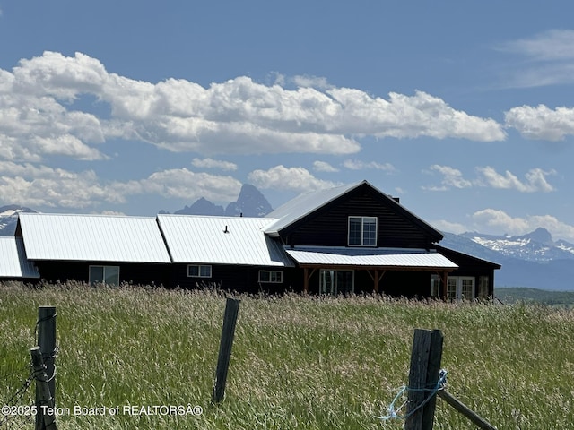 3525 W 13000 N, Felt, ID 83424 - view of side of property with a mountain view and a metal roof