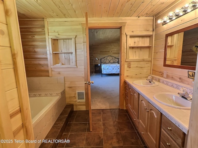 3525 W 13000 N, Felt, ID 83424 - ensuite bathroom featuring wooden ceiling, double vanity, wooden walls, a garden tub, and tile patterned flooring