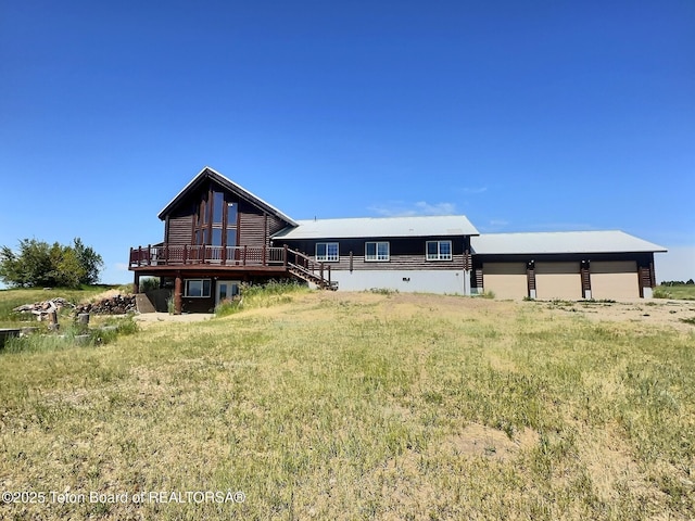 3525 W 13000 N, Felt, ID 83424 - rear view of house featuring a wooden deck and a garage