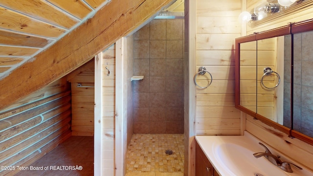 3525 W 13000 N, Felt, ID 83424 - bathroom with vanity, wooden walls, a stall shower, and tile patterned floors
