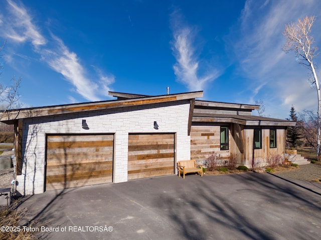 9632 Little Pine Ln, Victor, ID 83455 - view of front facade with a detached garage