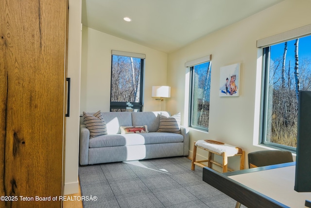 9632 Little Pine Ln, Victor, ID 83455 - living area featuring vaulted ceiling and recessed lighting