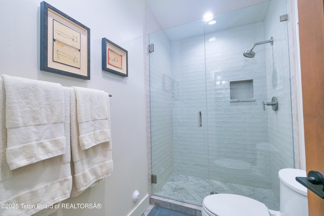 9632 Little Pine Ln, Victor, ID 83455 - bathroom featuring toilet and a stall shower