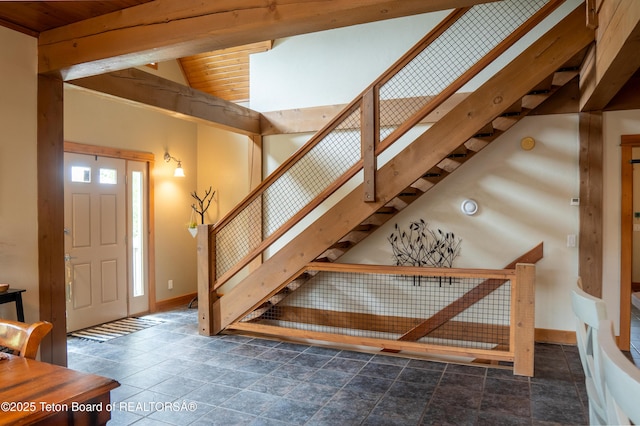 939 W Stuart St, Pinedale, WY 82941 - staircase featuring wooden ceiling and stone finish floors