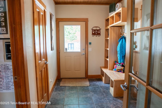 939 W Stuart St, Pinedale, WY 82941 - mudroom with baseboards and dark stone finish floors