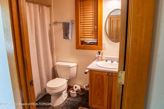 939 W Stuart St, Pinedale, WY 82941 - bathroom with vanity, tile patterned flooring, and a shower with curtain