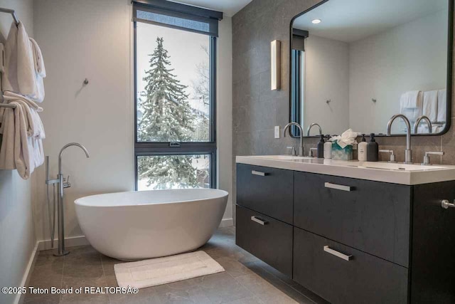 165 N Glenwood St # 30, Jackson, WY 83001 - full bathroom featuring double vanity and a freestanding tub