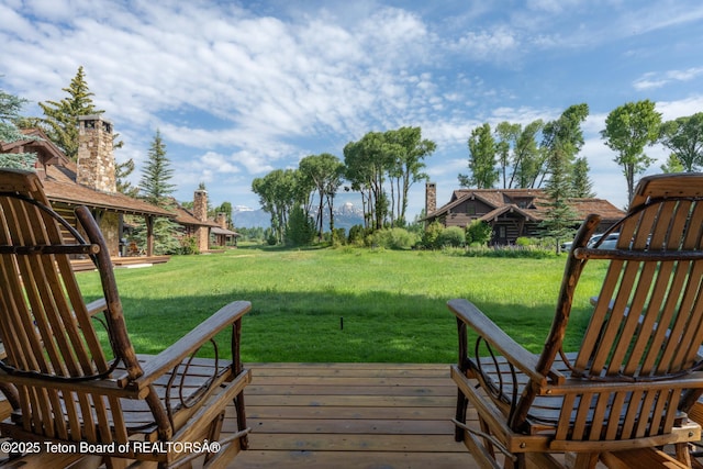 5862 N Coneflower Dr Unit 17, Jackson, WY 83001 - deck with a yard