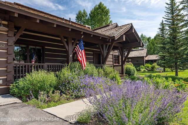 5862 N Coneflower Dr Unit 17, Jackson, WY 83001 - view of front of property with log siding