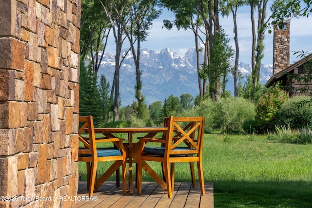 5862 N Coneflower Dr Unit 17, Jackson, WY 83001 - wooden terrace featuring a mountain view