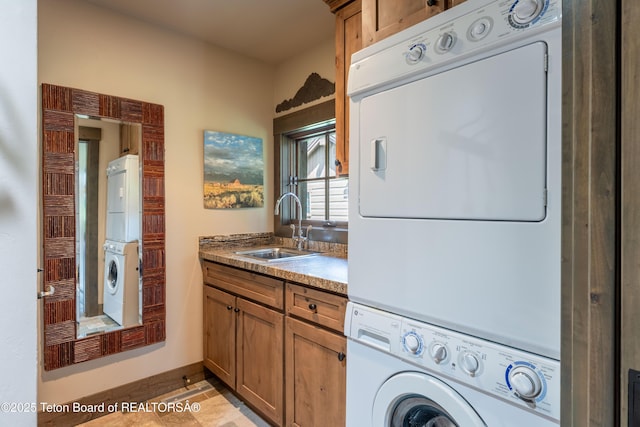 5862 N Coneflower Dr Unit 17, Jackson, WY 83001 - laundry room with stacked washer and clothes dryer