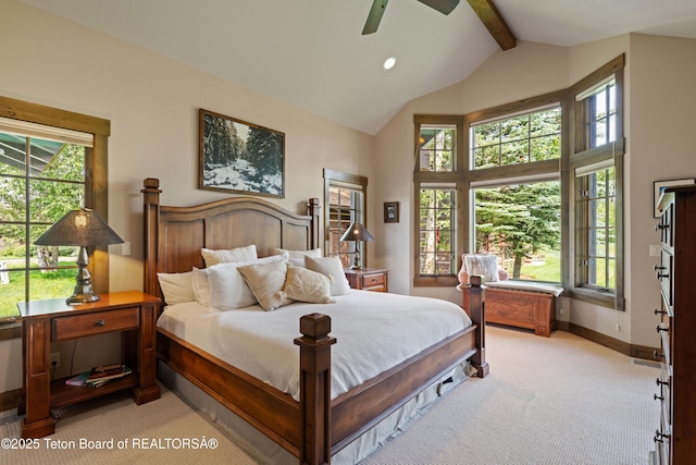 5862 N Coneflower Dr Unit 17, Jackson, WY 83001 - bedroom with light carpet, beamed ceiling, multiple windows, high vaulted ceiling, and a ceiling fan