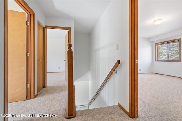 816 Powderhorn Ln Unit 816D, Jackson, WY 83001 - corridor with an upstairs landing and carpet flooring