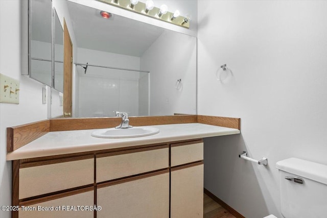 816 Powderhorn Ln Unit 816D, Jackson, WY 83001 - bathroom featuring toilet and vanity