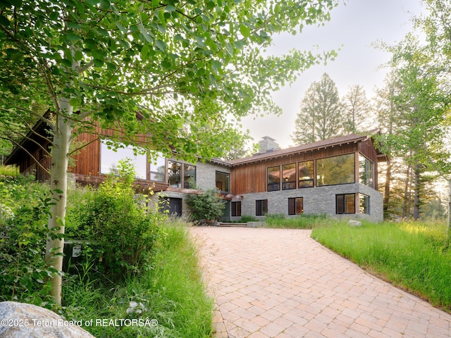 7970 N Granite Ridge Rd, Teton Village, WY 83025 - view of front of home featuring a chimney