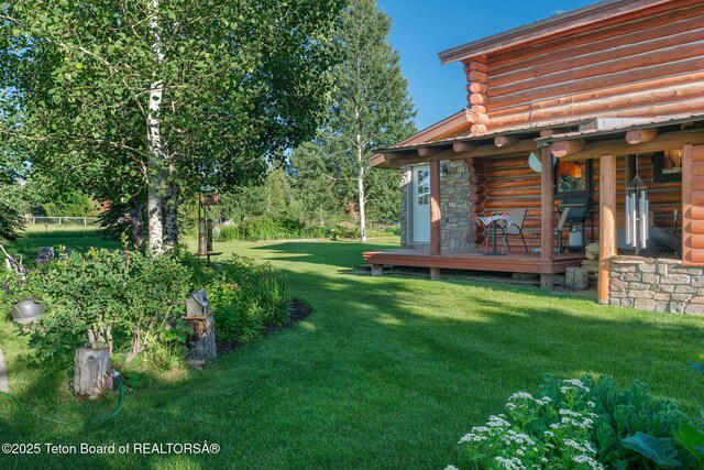 5100 Country Club Dr, Victor, ID 83455 - view of grassy yard featuring a wooden deck