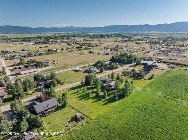 5100 Country Club Dr, Victor, ID 83455 - aerial view of property and surrounding area with mountains and rural landscape