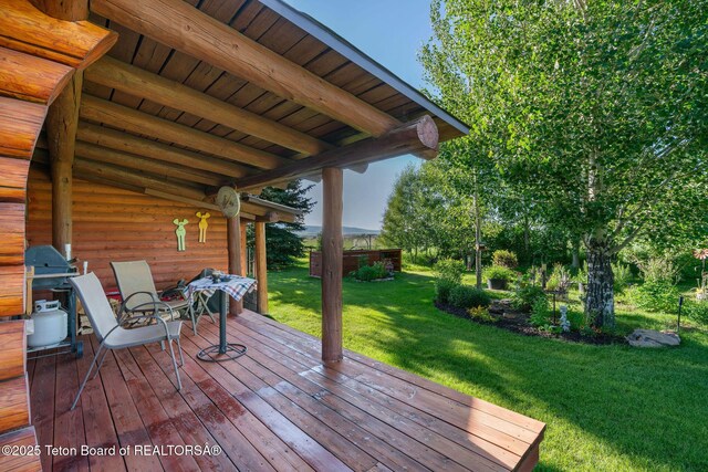 5100 Country Club Dr, Victor, ID 83455 - wooden deck with a lawn