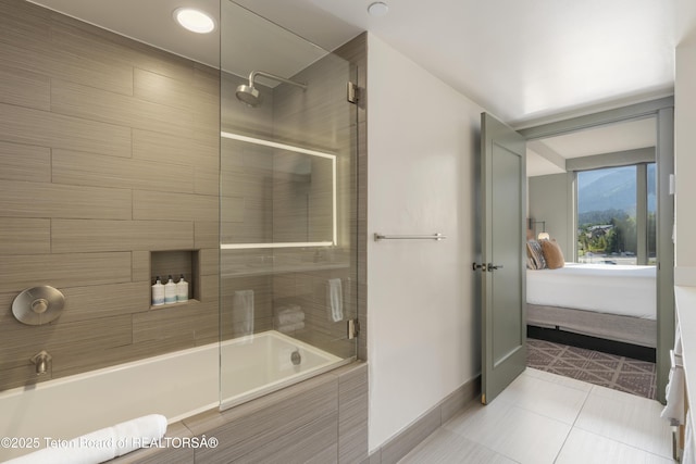 3325 W Village Dr Unit 359/361, Teton Village, WY 83025 - bathroom with tiled shower / bath combo, tile patterned floors, and ensuite bath