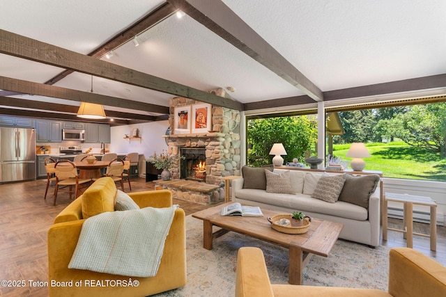550 E Golf Creek Ln Unit 41, Jackson, WY 83001 - living room featuring plenty of natural light and a fireplace