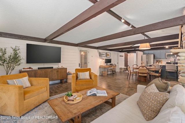 550 E Golf Creek Ln Unit 41, Jackson, WY 83001 - living room featuring beam ceiling