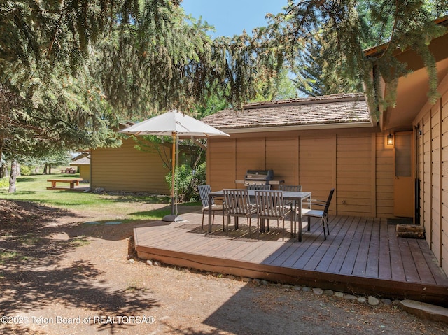 550 E Golf Creek Ln Unit 41, Jackson, WY 83001 - wooden terrace featuring outdoor dining area