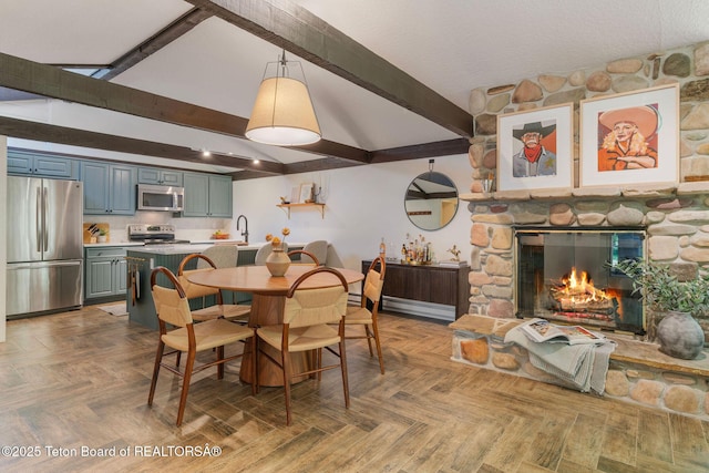 550 E Golf Creek Ln Unit 41, Jackson, WY 83001 - dining room with a stone fireplace
