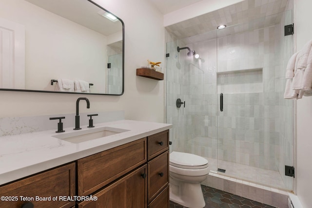 550 E Golf Creek Ln Unit 41, Jackson, WY 83001 - full bath featuring baseboard heating, vanity, a stall shower, and tile patterned flooring