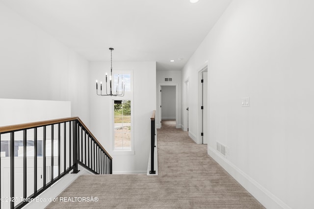 555 Silver Fox Ln, Victor, ID 83455 - corridor with an upstairs landing, a chandelier, carpet, and recessed lighting