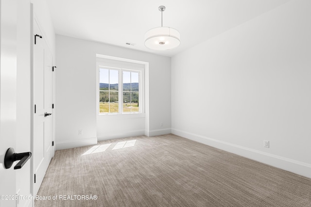 555 Silver Fox Ln, Victor, ID 83455 - empty room featuring carpet flooring and baseboards
