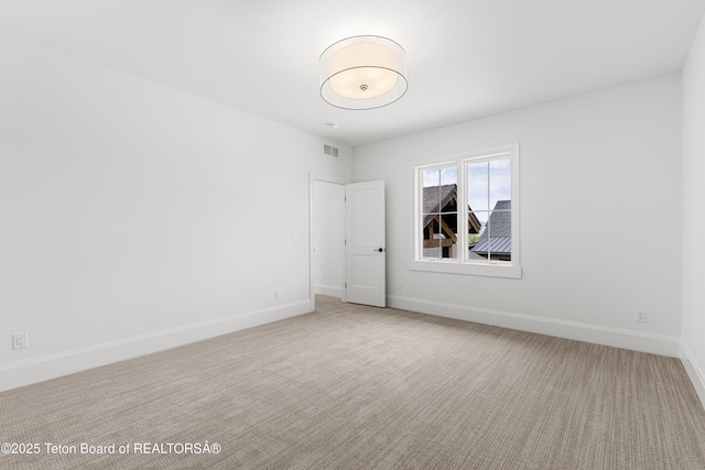 555 Silver Fox Ln, Victor, ID 83455 - empty room featuring carpet and baseboards