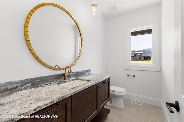 555 Silver Fox Ln, Victor, ID 83455 - bathroom featuring baseboards and vanity
