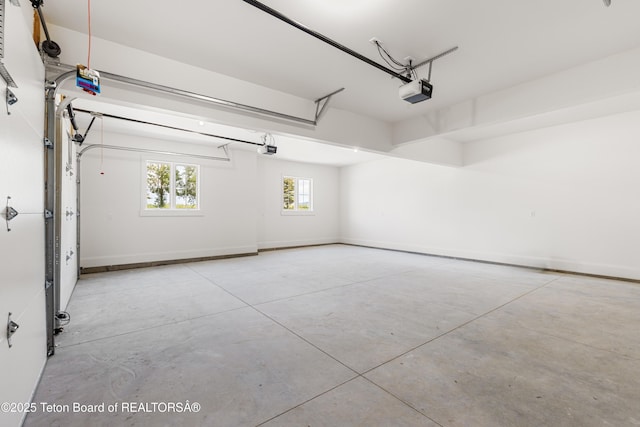 555 Silver Fox Ln, Victor, ID 83455 - garage featuring a garage door opener